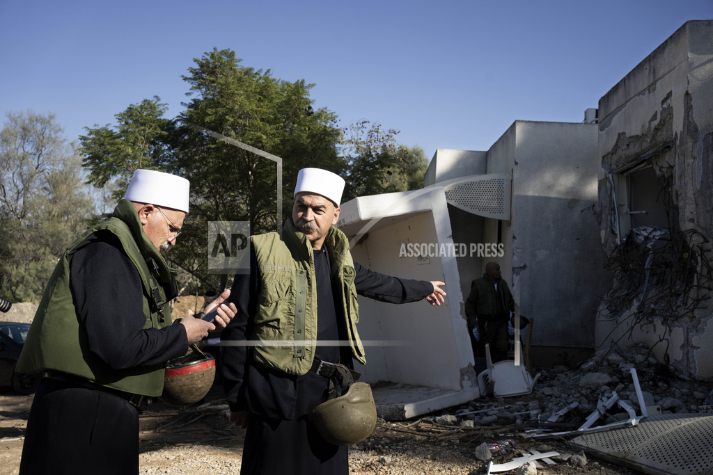 Druze faith leaders tour Kibbutz Kfar Azza with their Muslim, Jewish and Christian counterparts ahead of an interfaith joint prayer near the Israel-Gaza border