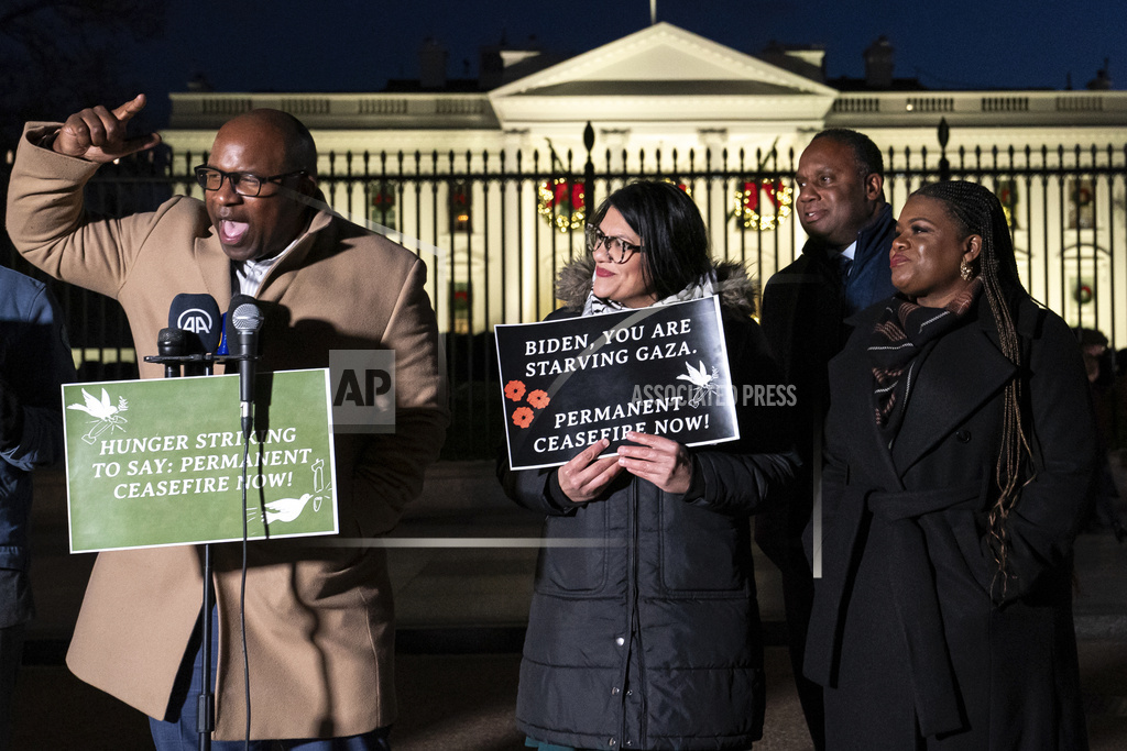 Rep. Jamaal Bowman, D-N.Y., from left, speaks alongside, Rep. Rashida Tlaib, D-Mich., Rep. Jonathan Jackson, D-Ill., and Rep. Cori Bush, D-Mo., during a vigil with state legislators and faith leaders currently on hunger strike outside the White House