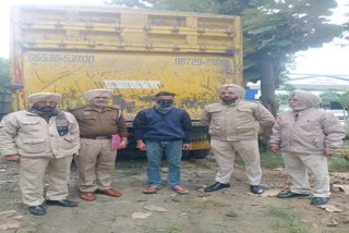 Amritsar police arrested  men with tipper full of sand