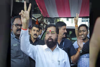 File - Maharashtra Chief Minister Eknath Shinde flashes victory sign