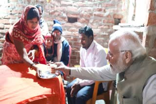 PM Modi meets Ujjwala beneficiary