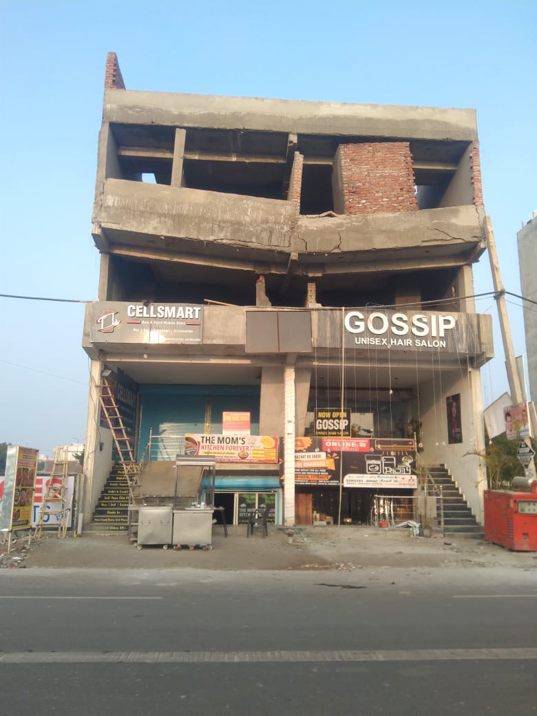 Building tilted in Faridabad workers trapped rescued with Crane