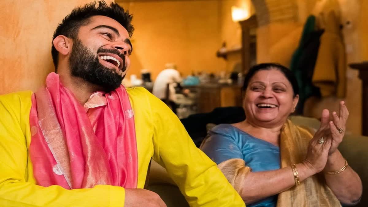 Virat Kohli and his mother