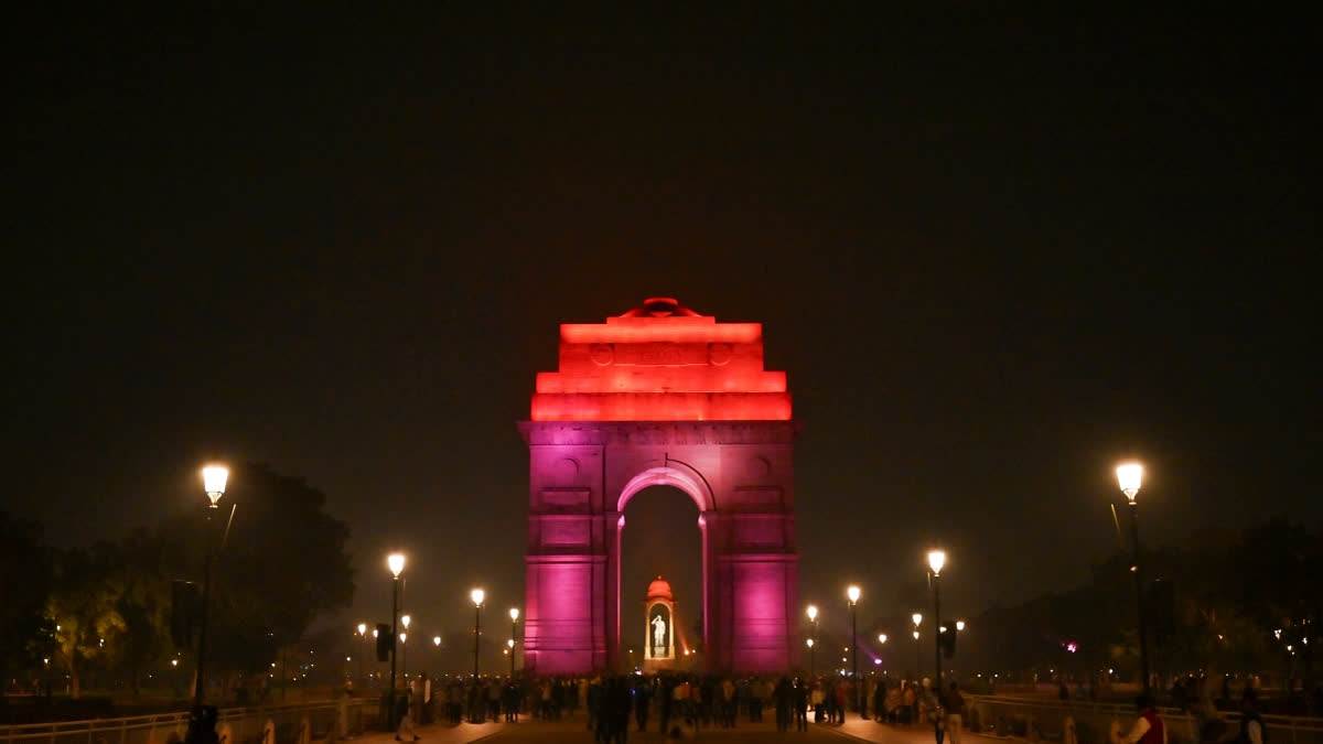 India Gate illuminated in purple and orange on the occasion of World Neglected Tropical Diseases Day, in New Delhi, Thursday, Jan. 30, 2025.