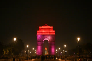 India Gate illuminated in purple and orange on the occasion of World Neglected Tropical Diseases Day, in New Delhi, Thursday, Jan. 30, 2025.