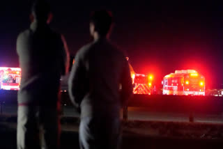 Emergency equipment stages at Gravelly Point, north of Ronald Reagan Washington National Airport, along the Potomac River, Wednesday, Jan. 29, 2025, in Arlington, Va.