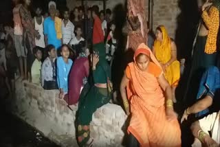 Locals mourn the deaths of pilgrims in Jammu bus accident, at twin villages of Hathras in Uttar Pradesh