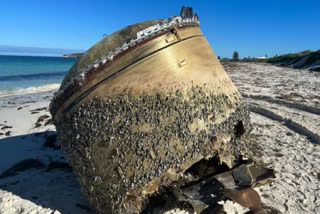 MYSTERIOUS OBJECT ON BEACH POSSIBLY DEBRIS OF INDIAN ROCKET CLAIMS AUSTRALIAN SPACE AGENCY