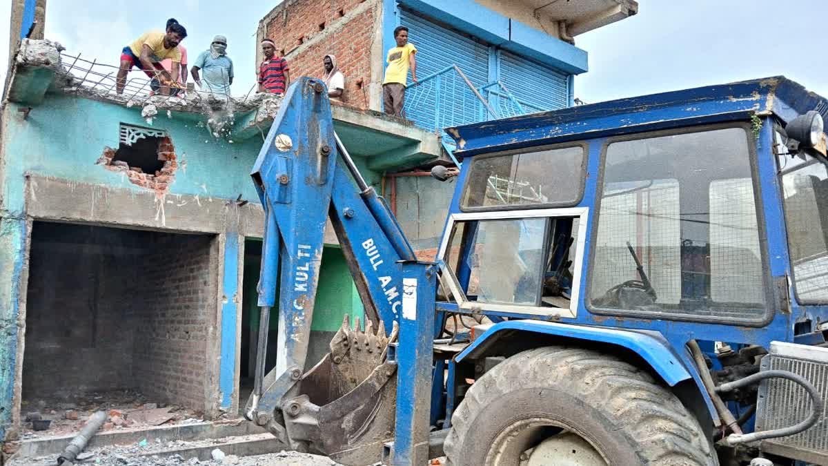 Bulldozer Demolish Illegal Structures