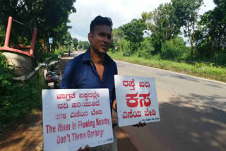 'River is flowing nearby, don't throw garbage': A youth stands on side of national highway for environmental awareness in Karnataka