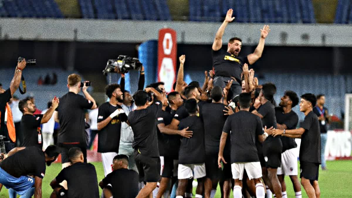 OWNER JOHN ABRAHAM CELEBRATES AS NORTHEAST UNITED CLINCHES THEIR FIRST EVER NATIONAL LEVEL TROPHY