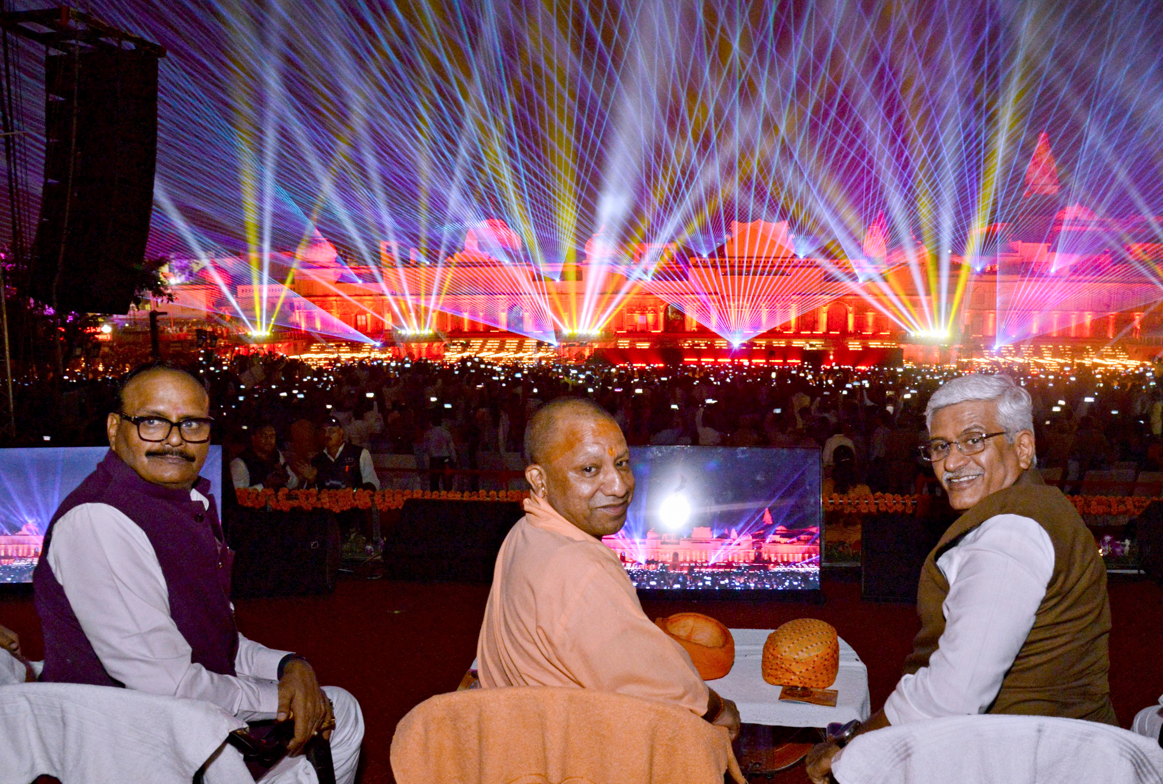 UP CM Yogi Adityanath with Union Minister Gajendra Singh Shekhawat, and Deputy CM Brajesh Pathak witness 'Ram Katha' brought alive through laser light and sound organized on the occasion of Deepotsav celebrations, at Ram Ki Paidi in Ayodhya on Wednesday.