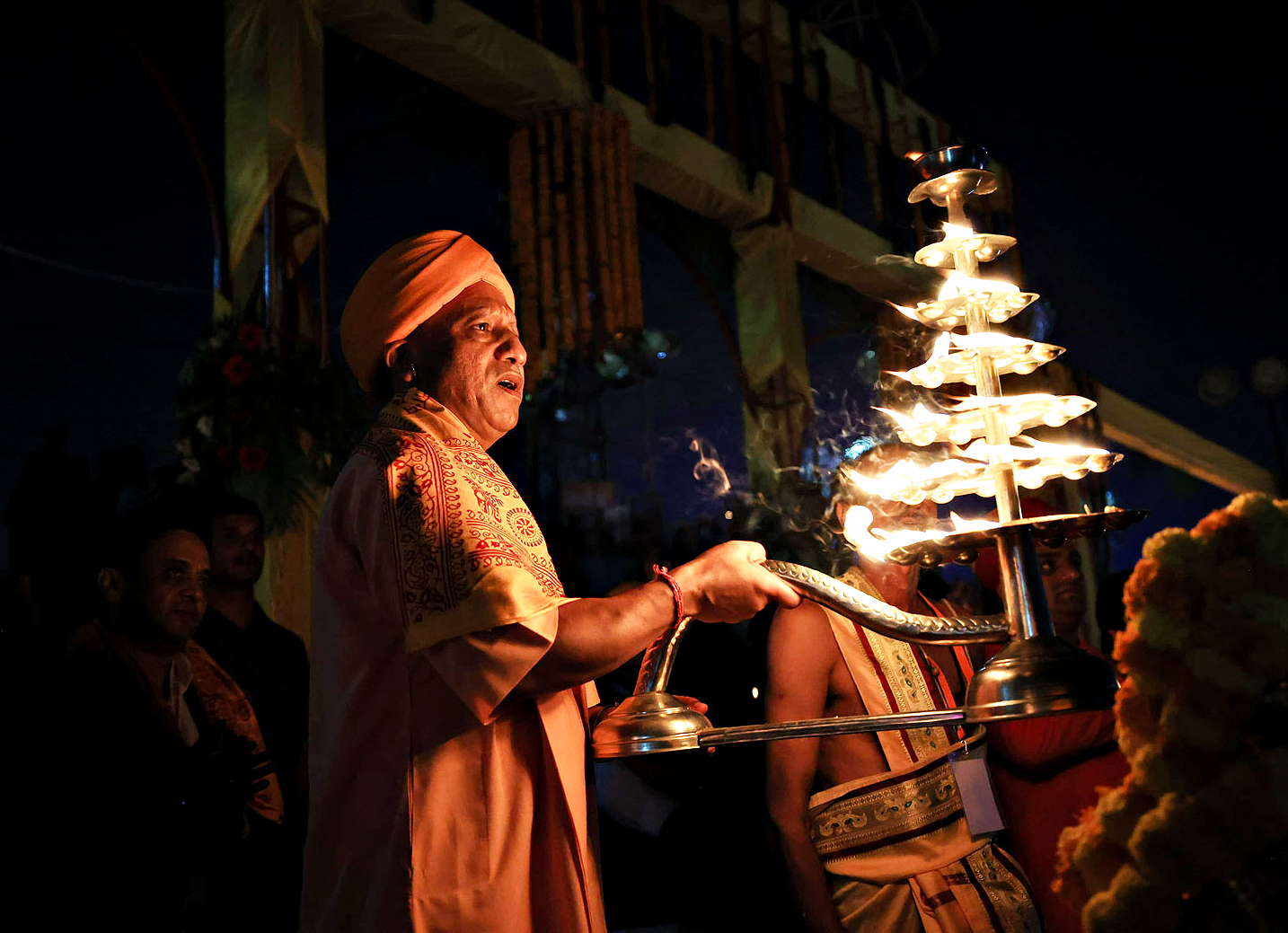 Uttar Pradesh CM Yogi Adityanath performs aarti at Saryu Ghat during the Deepotsav celebrations, in Ayodhya on Wednesday