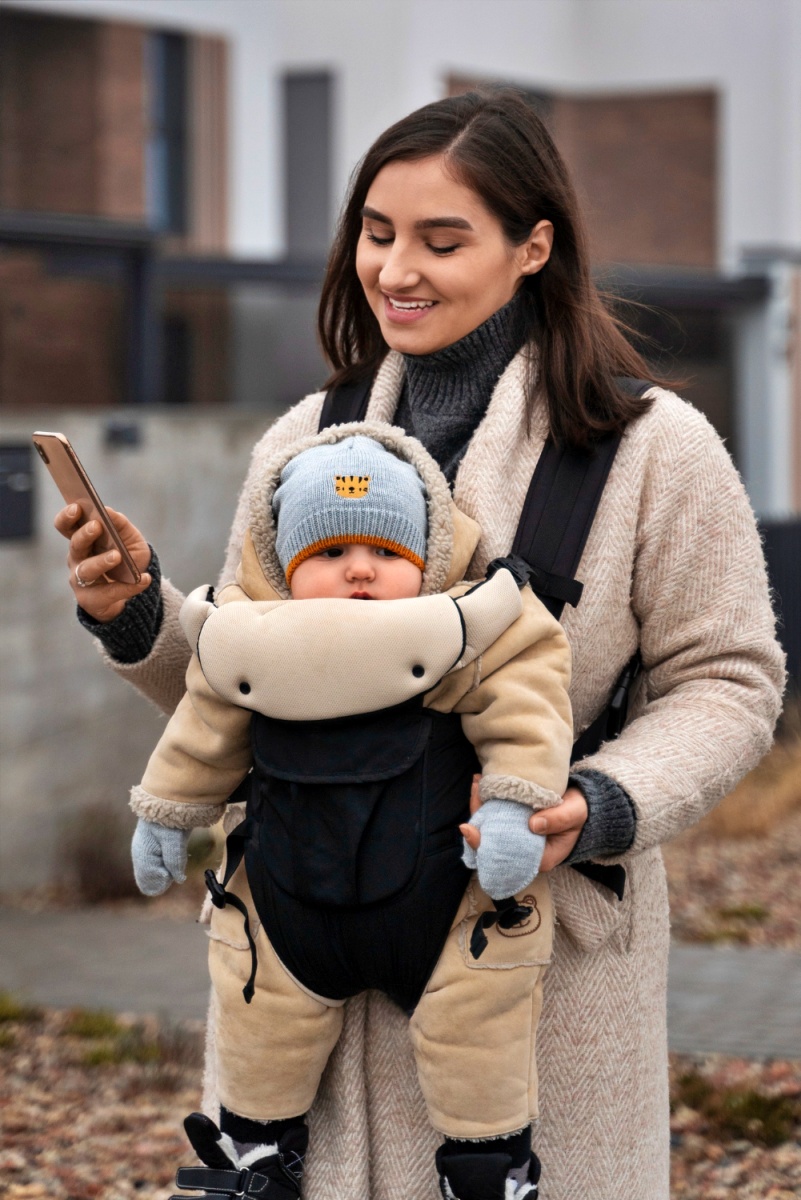 Keep your baby close with a baby carrier or sling