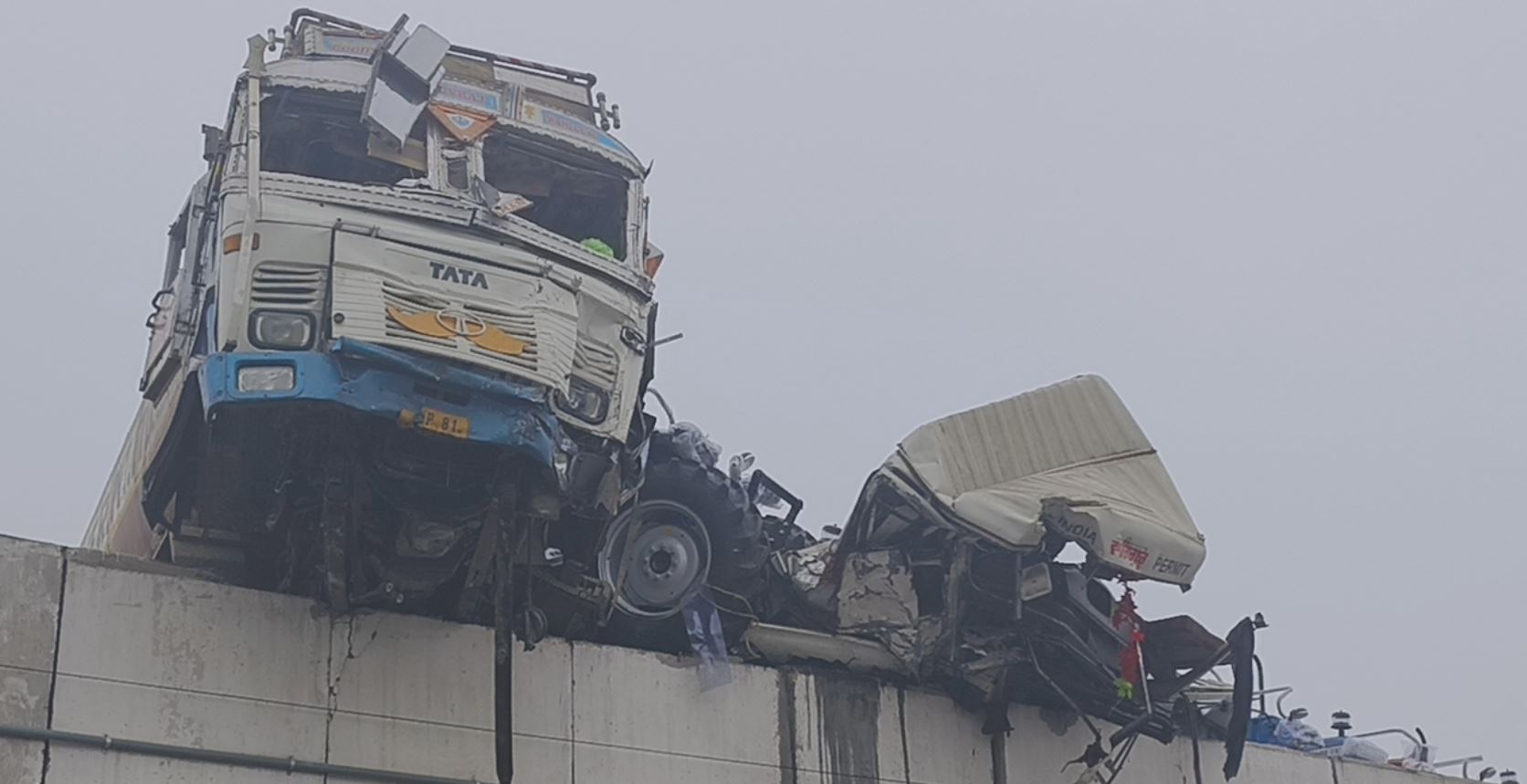 Panipat Road accident Trucks Collide Trucks Hangs from Samalkha Bridge Railing