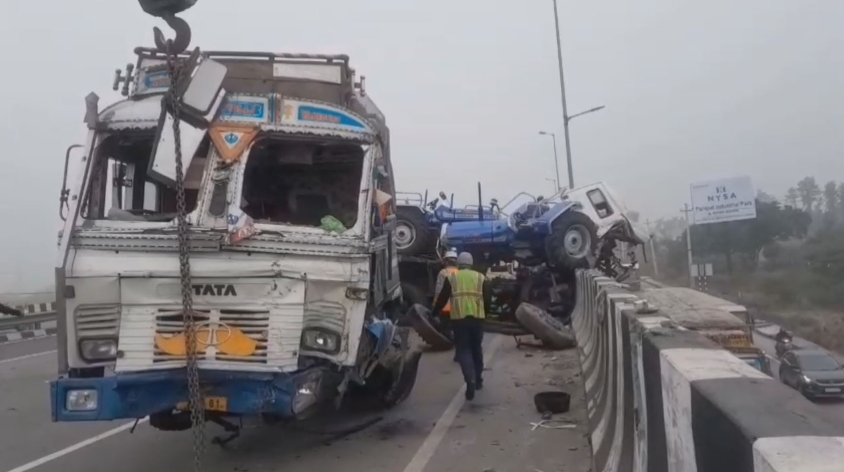 Panipat Road accident Trucks Collide Trucks Hangs from Samalkha Bridge Railing