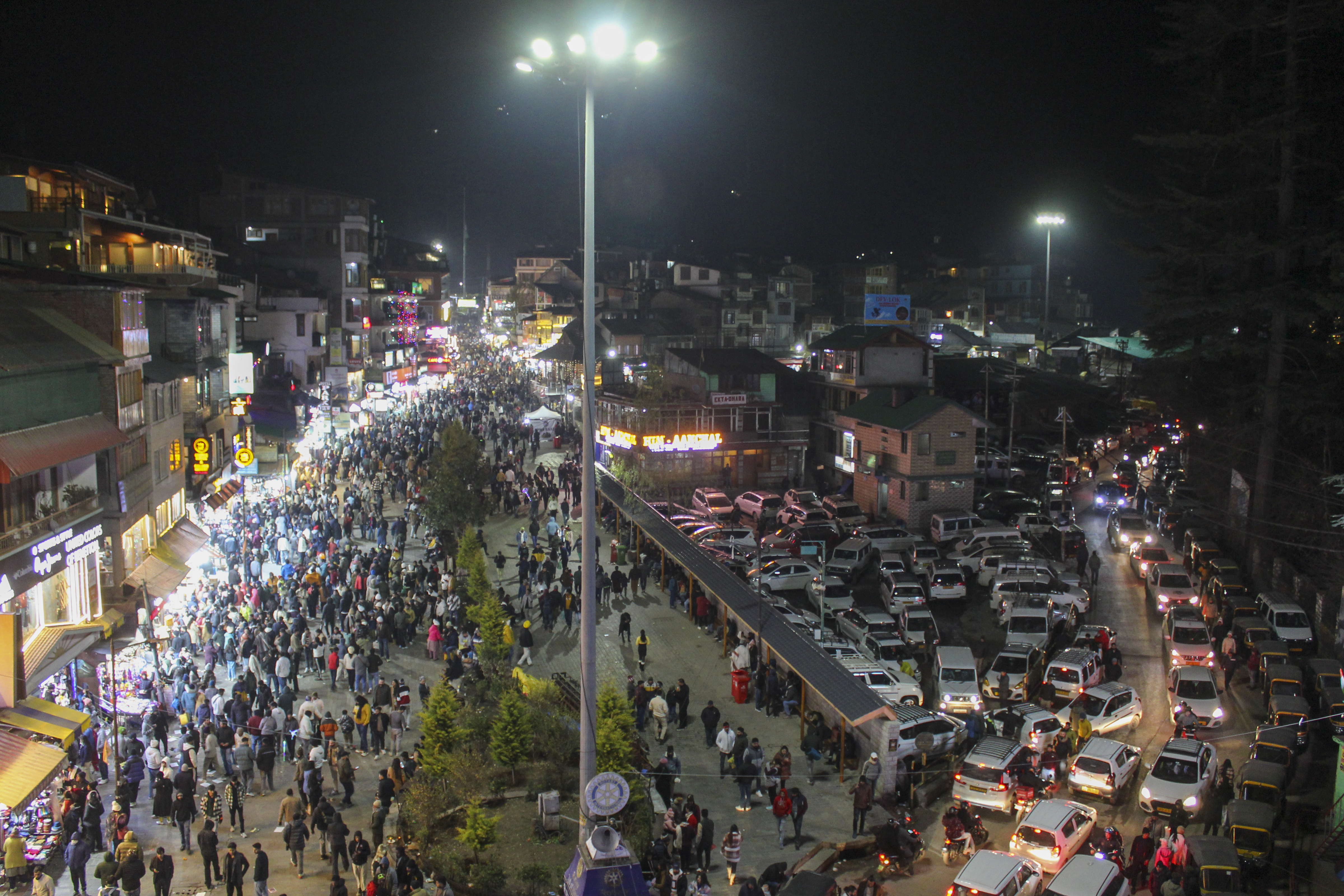 Kullu: Visitors gather to celebrate on the eve of the new year 2025, at Manali in Kullu district, Himachal Pradesh, Tuesday, Dec. 31, 2024.