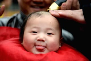 Chinese couples can now have three children