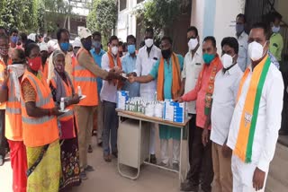 sanitiazers, masks distribution to metpally labours