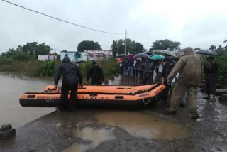 boy washed away in swollen sewer in betul