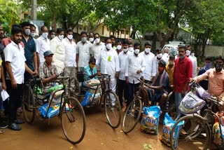 sathupalli mla sandra venkataveeraiah distributed groceries to physically handicaped people