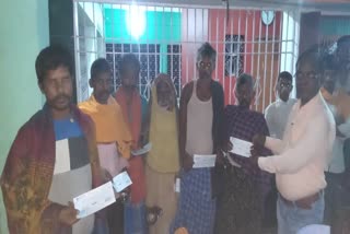Distribution of assistance amount among fire victims in Bhojpur