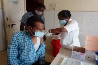 People standing in queue for vaccinate  