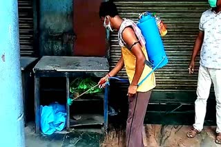 Used ppe kit in front of a shop in tarakeswar bus stand 