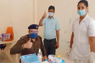 Officers and police personnel take vaccine 