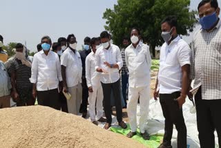 MLA Nomula Bhagat visiting a rice procurement center in Nalgonda