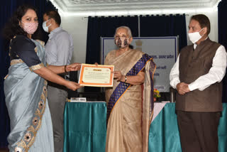 governor anandiben patel honored 21 voluntary organizaton