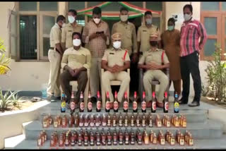 vetapalem police caught illegal liquor 