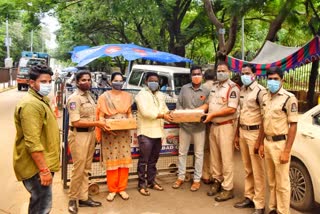 Energy drinks distribution to police in Hyderabad