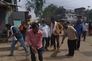 BJP workers sweep during the service week