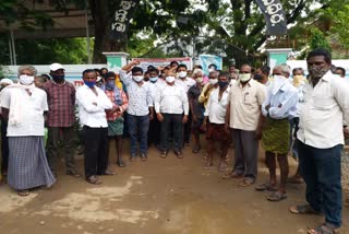 madhira people protest infront of corna vaccine center