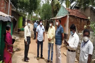 Officials visit to virus infected person home