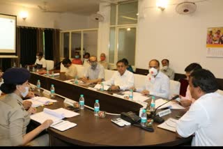 Commissioners and others during review meeting