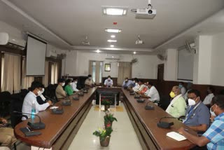 Crisis management committee meeting chaired by collector