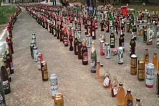 Andhra Pradesh police destroys illegal liquor bottles seized during raids Andhra Pradesh Andhra Pradesh latest news Andhra Pradesh police Andhra Pradesh police raid liquor bottles seized during raids അനധികൃതമായി പിടിച്ചെടുത്ത മദ്യക്കുപ്പികൾ അനധികൃത മദ്യം അനധികൃത മദ്യം നശിപ്പിച്ചു കൃഷ്ണ ജില്ലാ പൊലീസ്