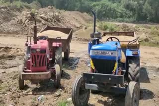 two tractor sand loaded seized in dhanbad