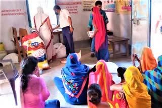 take home ration distribution at anganwadi centers