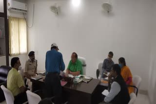 sp and dc held a review meeting in Chaibasa