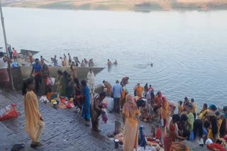 crowd of devotees at ganga ghat on occasion of kartik month