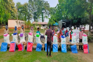 gunj organization distribute relief material among poor