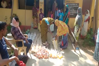 distribution of raw food material to school students
