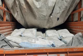 Seizure of illegally moving Singareni cement bags