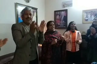 Celebrating Christmas by singing the song of Jesus at home in delhi