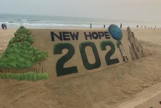 SANDART WITH MESSAGE NEW HOPE 2021 AT PURI BEACH IN ODISHA