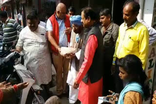 Former municipality president distributed ration to the poor on new year