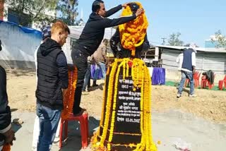 Wreaths on Jaypal Singh Munda statue